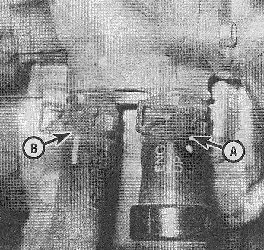 Chevrolet Silverado Cooling, heating and air conditioning systems _ Disconnect the expansion tank hose ( A) and the heater hose (B)